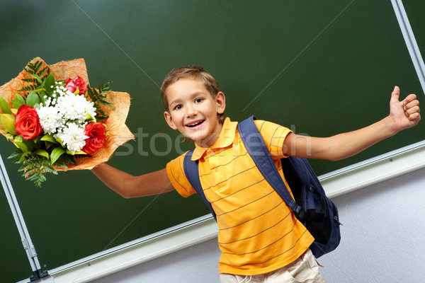 Boy with flowers Stock photo © pressmaster