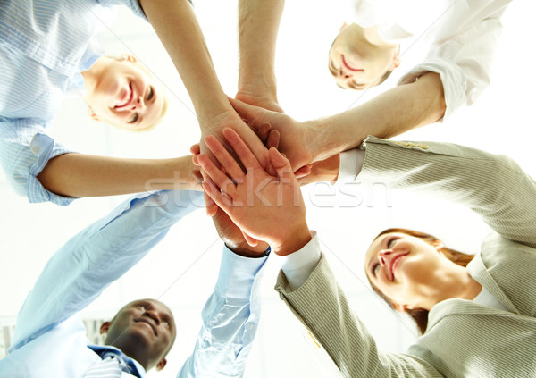 Közös támogatás négy üzletemberek kezek kollégák Stock fotó © pressmaster