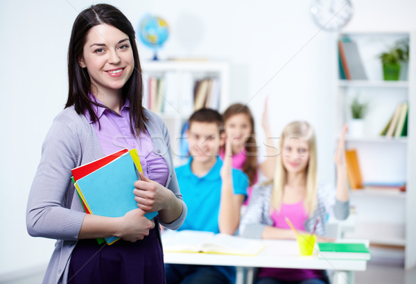 Heureux enseignants regarder caméra élèves fille [[stock_photo]] © pressmaster