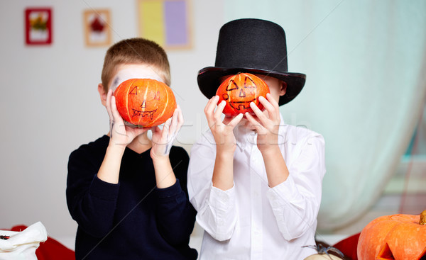 Pumpkin-faced boys Stock photo © pressmaster