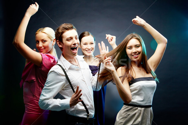 Dance cztery radosny znajomych taniec wraz Zdjęcia stock © pressmaster