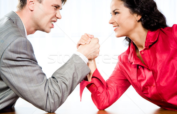 бороться портрет улыбающаяся женщина сердиться человека Сток-фото © pressmaster