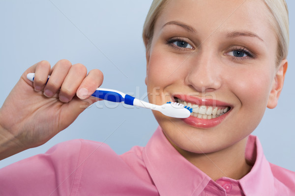 Stock photo: Cleaning teeth