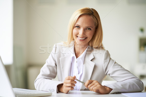 Businesswoman at workplace Stock photo © pressmaster