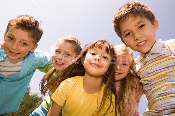 Boldog gyerekek portré gyerekek mosolyog átkarol Stock fotó © pressmaster