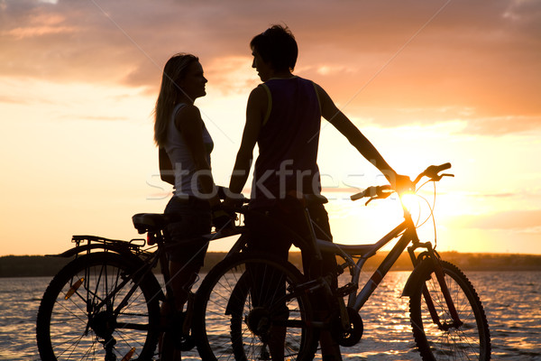 Dragoste natură lac biciclete uita Imagine de stoc © pressmaster