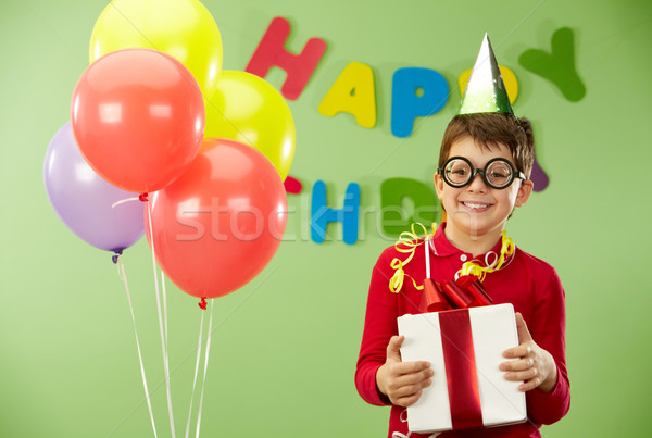 Feliz rapaz retrato engraçado óculos festa de aniversário Foto stock © pressmaster