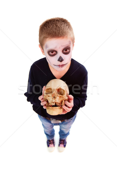Boy with skull Stock photo © pressmaster