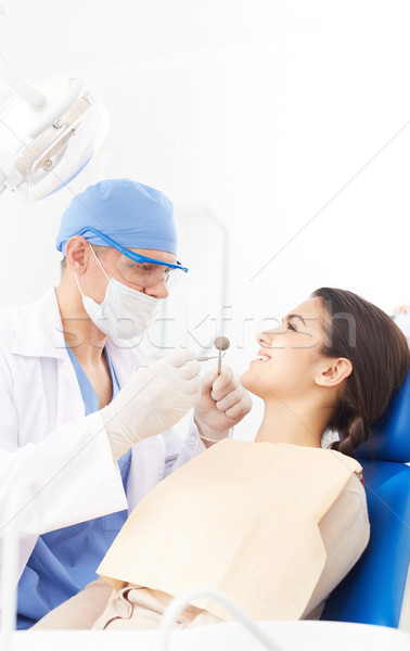 Dişçi genç kız oral kadın tıp mavi Stok fotoğraf © pressmaster