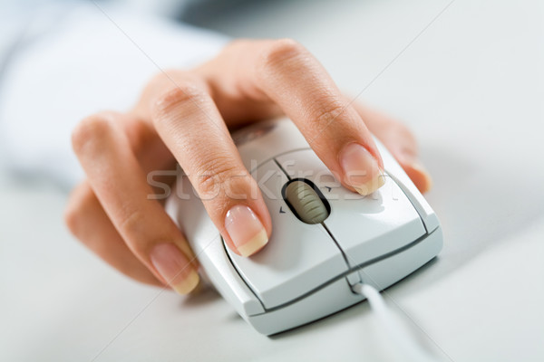 Hand on mouse Stock photo © pressmaster