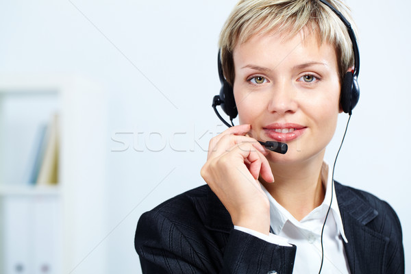 Femminile receptionist ritratto attrattivo auricolare lavoro Foto d'archivio © pressmaster