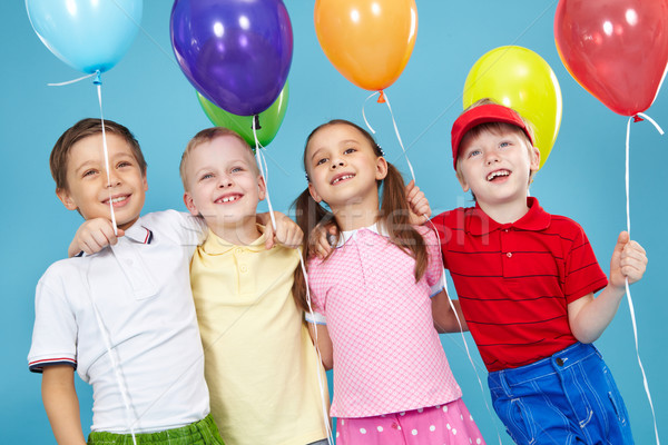 Balon wszyscy uśmiechnięty dzieci patrząc coś Zdjęcia stock © pressmaster