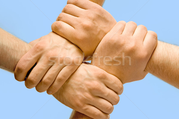 Partnerschaft Bild Hände isoliert blau Business Stock foto © pressmaster