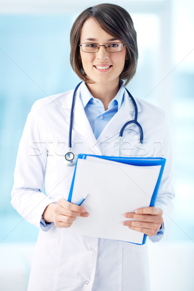 Clinician with documents Stock photo © pressmaster
