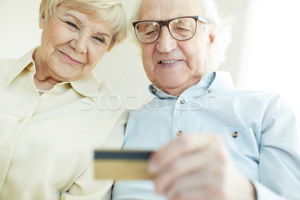 Senior couple with card Stock photo © pressmaster