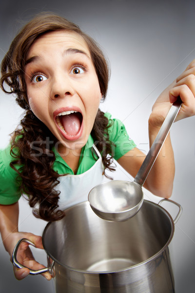 Girl with a ladle Stock photo © pressmaster