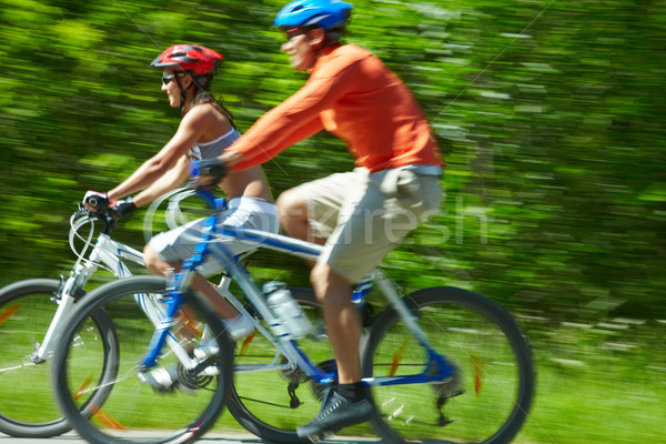 Biciklisták mozgás kép kettő lovaglás lefelé Stock fotó © pressmaster