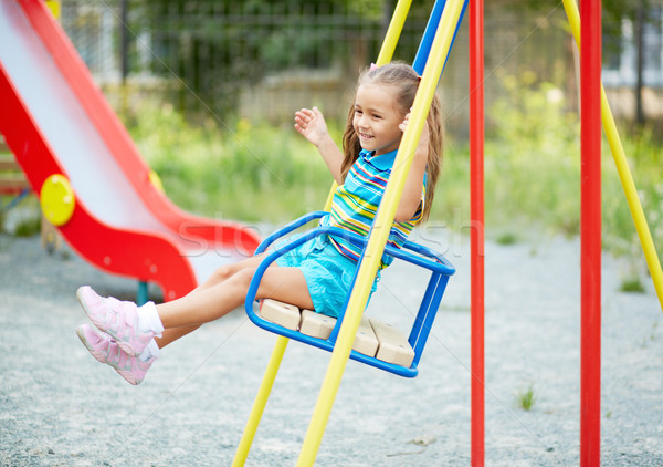 Girl on swing Stock photo © pressmaster