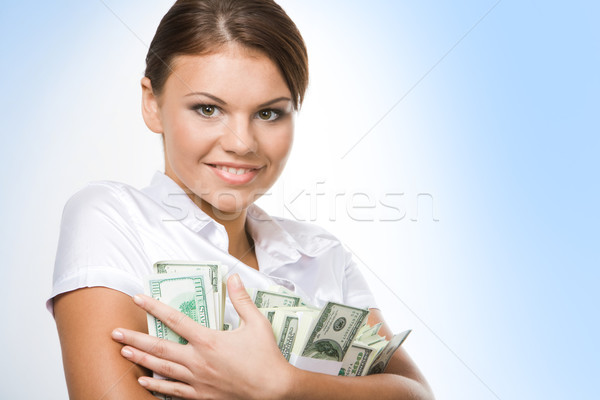 Woman holding money  Stock photo © pressmaster