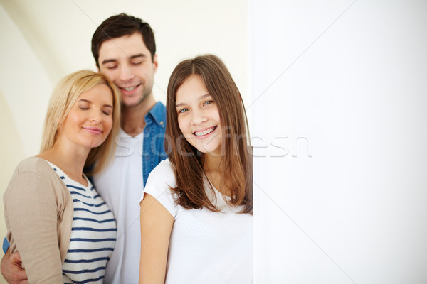 Famille trois portrait famille heureuse isolement femme [[stock_photo]] © pressmaster