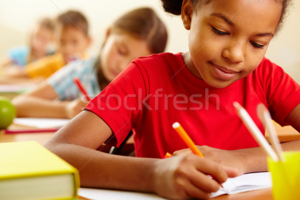 Schoolchild drawing Stock photo © pressmaster