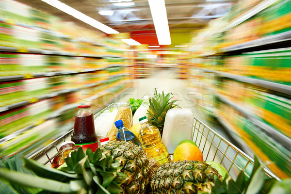 Winkelwagen producten afbeelding vol supermarkt licht Stockfoto © pressmaster