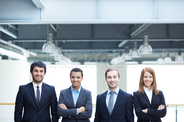 Több nemzetiségű üzleti csapat csoport barátságos üzletemberek öltönyök Stock fotó © pressmaster