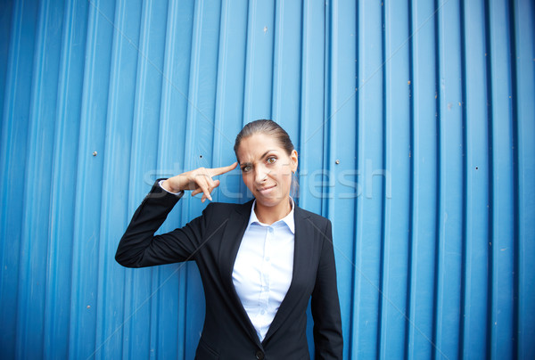 Confusión imagen jóvenes mujer de negocios pie azul Foto stock © pressmaster