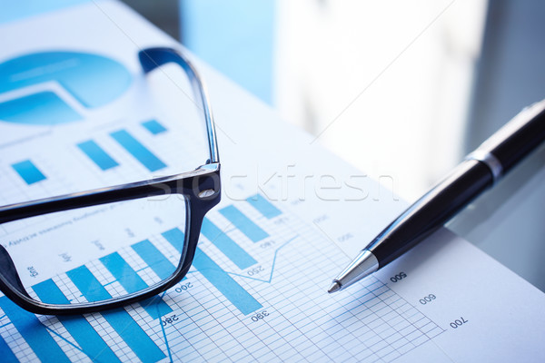 Affaires données image lunettes stylo financière [[stock_photo]] © pressmaster
