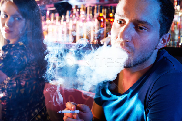 Guy smoking Stock photo © pressmaster
