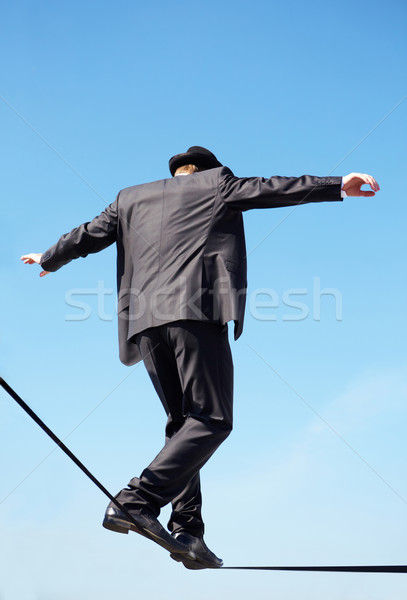 Akrobata fotó szakképzett üzletember sétál lefelé Stock fotó © pressmaster