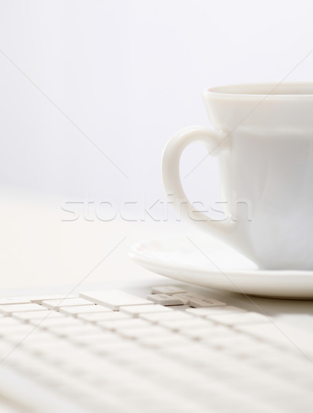 Cup on keypad Stock photo © pressmaster