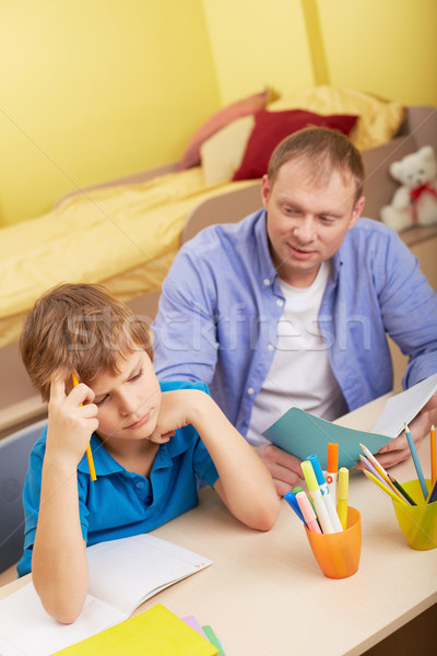 Schoolwork with father Stock photo © pressmaster