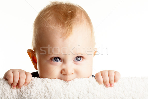 Curieux bébé visage sur bord isolement [[stock_photo]] © pressmaster