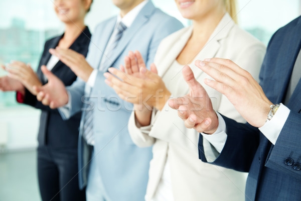 Siker fotó üzleti partnerek kezek tapsol megbeszélés Stock fotó © pressmaster