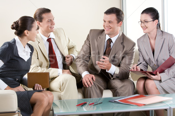 бизнеса переговоры портрет Бизнес-партнеры сидят диван Сток-фото © pressmaster