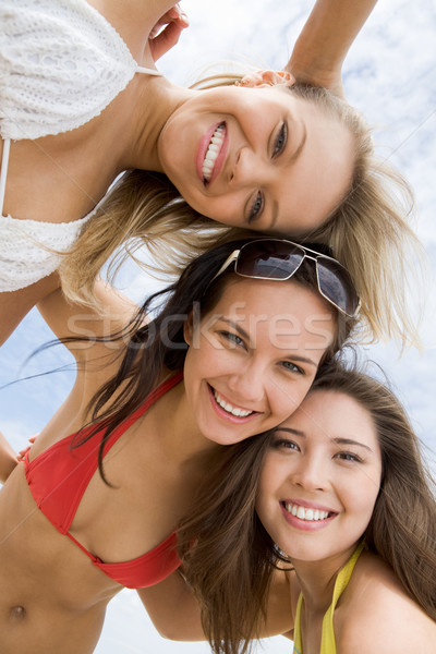 Együttlét portré boldog lányok bikini átkarol Stock fotó © pressmaster