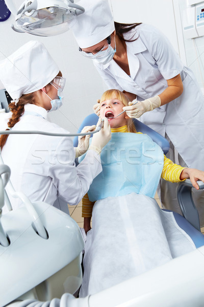 Stock photo: Girl in dentist's office