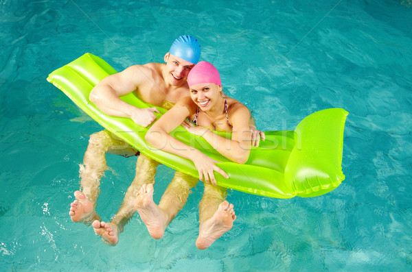 Pár víz fotó boldog matrac úszómedence Stock fotó © pressmaster