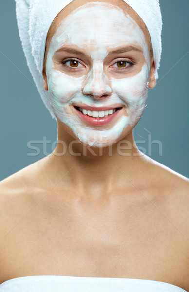 Woman with facial mask Stock photo © pressmaster
