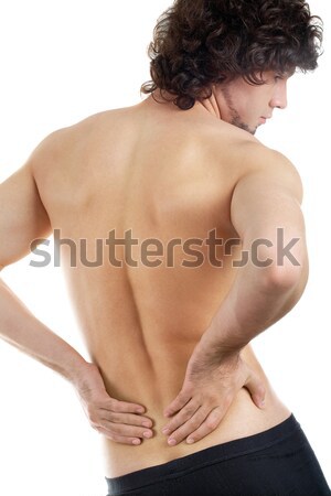 Spinal problema vedere din spate tânăr atingere mână Imagine de stoc © pressmaster