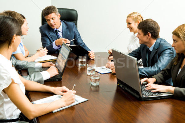 Onderhandelingen portret zakenlieden communiceren werken vergadering Stockfoto © pressmaster