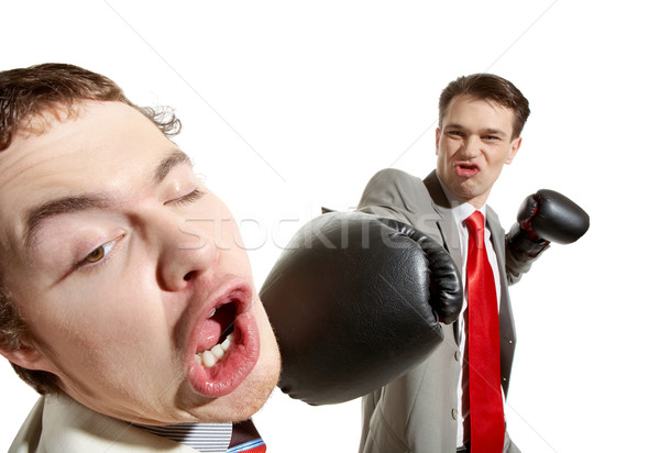 Forte calci ritratto aggressivo imprenditore guantoni da boxe Foto d'archivio © pressmaster