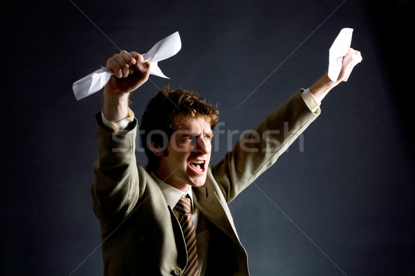 Man with papers Stock photo © pressmaster