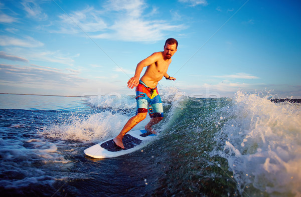 Man surfboarding Stock photo © pressmaster