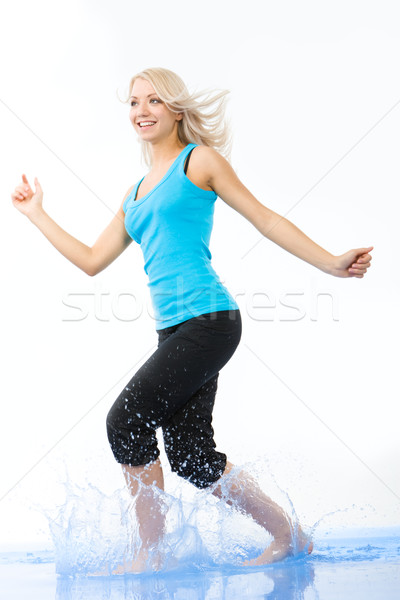 Energiek vrouwelijke portret blond lachend Stockfoto © pressmaster