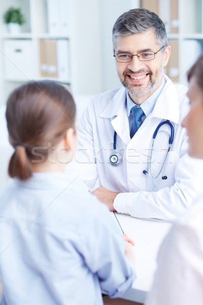 Exitoso médico practicante consulta femenino hija Foto stock © pressmaster