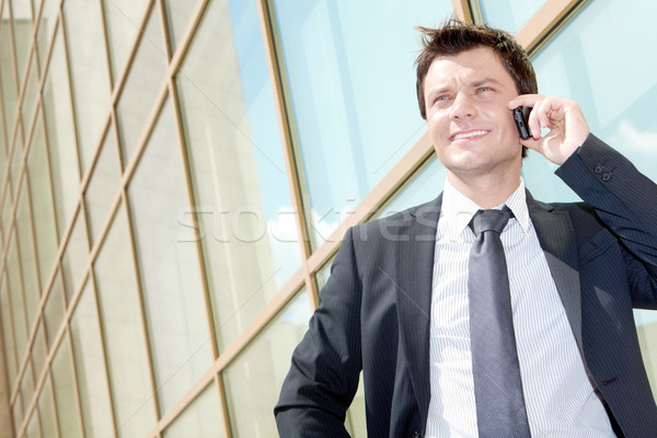 Ocupado retrato exitoso joven llamando Foto stock © pressmaster