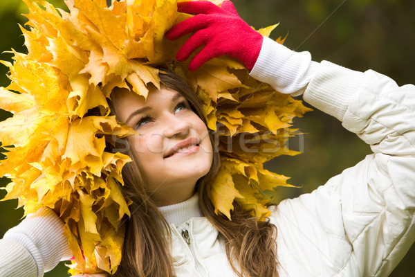 Woman in maple wreath  Stock photo © pressmaster