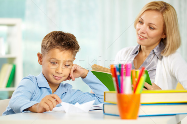 Stock photo: Boy with paper plane